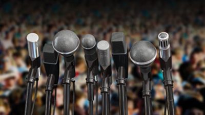 Microphones on a podium