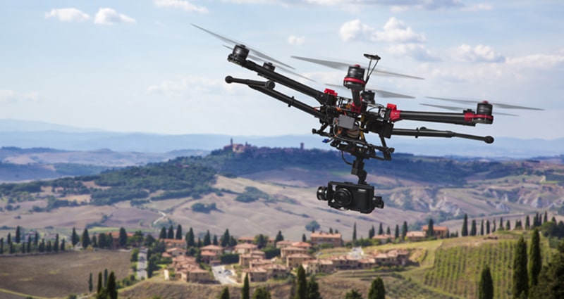 Drone flying above countryside