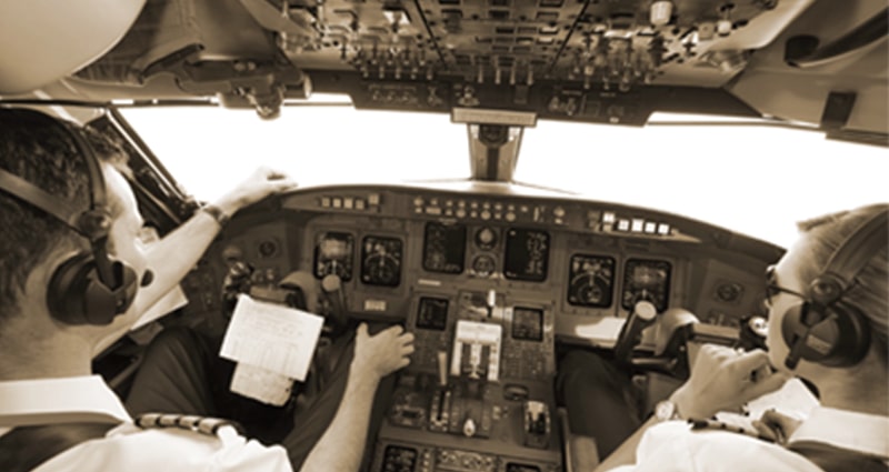 Two pilots sitting in cockpit