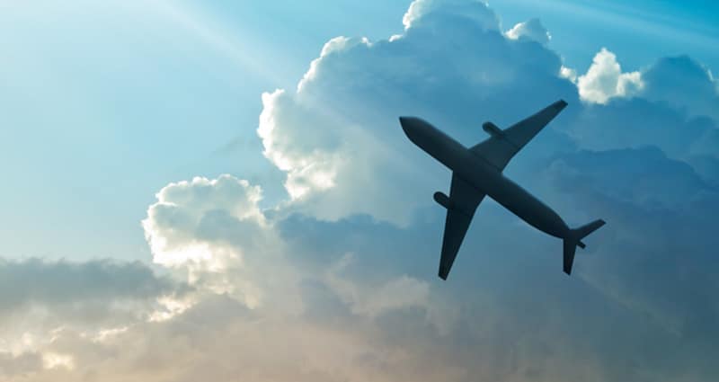 Commercial plane flying in clouds