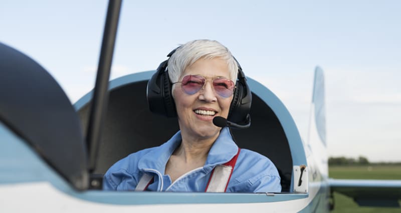 Pilot smiling from cockpit