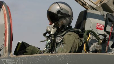 Fighter pilot preparing for takeoff