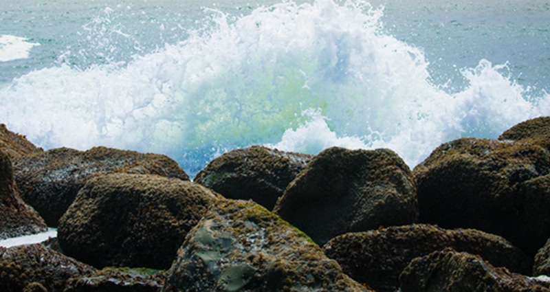 Waves crashing into rocks