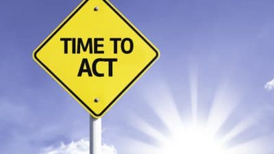 time to act sign