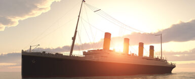 historic passenger ship Titanic on the high seas at sunset